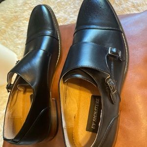 Mens size 12 black leather loafer with buckles
UV SIGNATURE